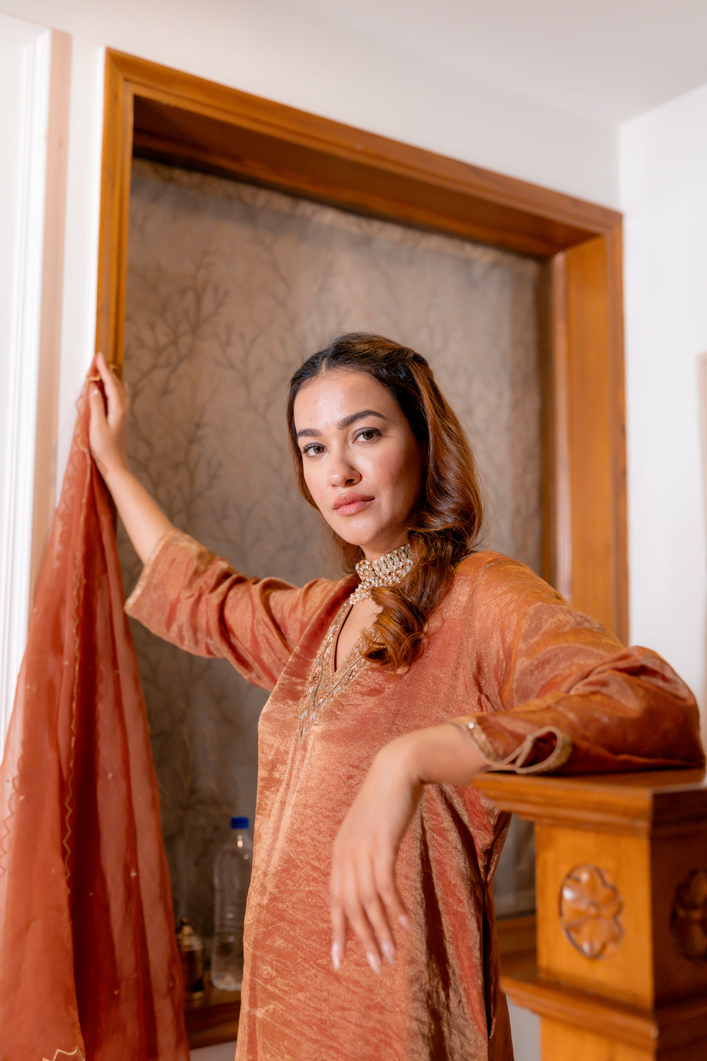 Close up side View of Tamra Copper Organza Kurta Set.