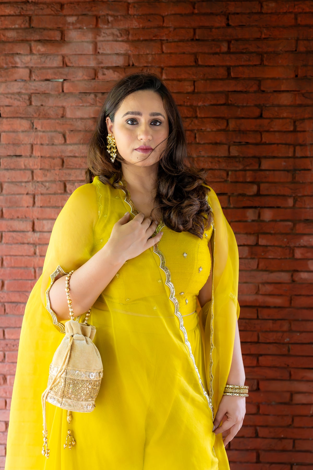 Front view of sleeves design work of Bindu Noor Cape Palazzo set.