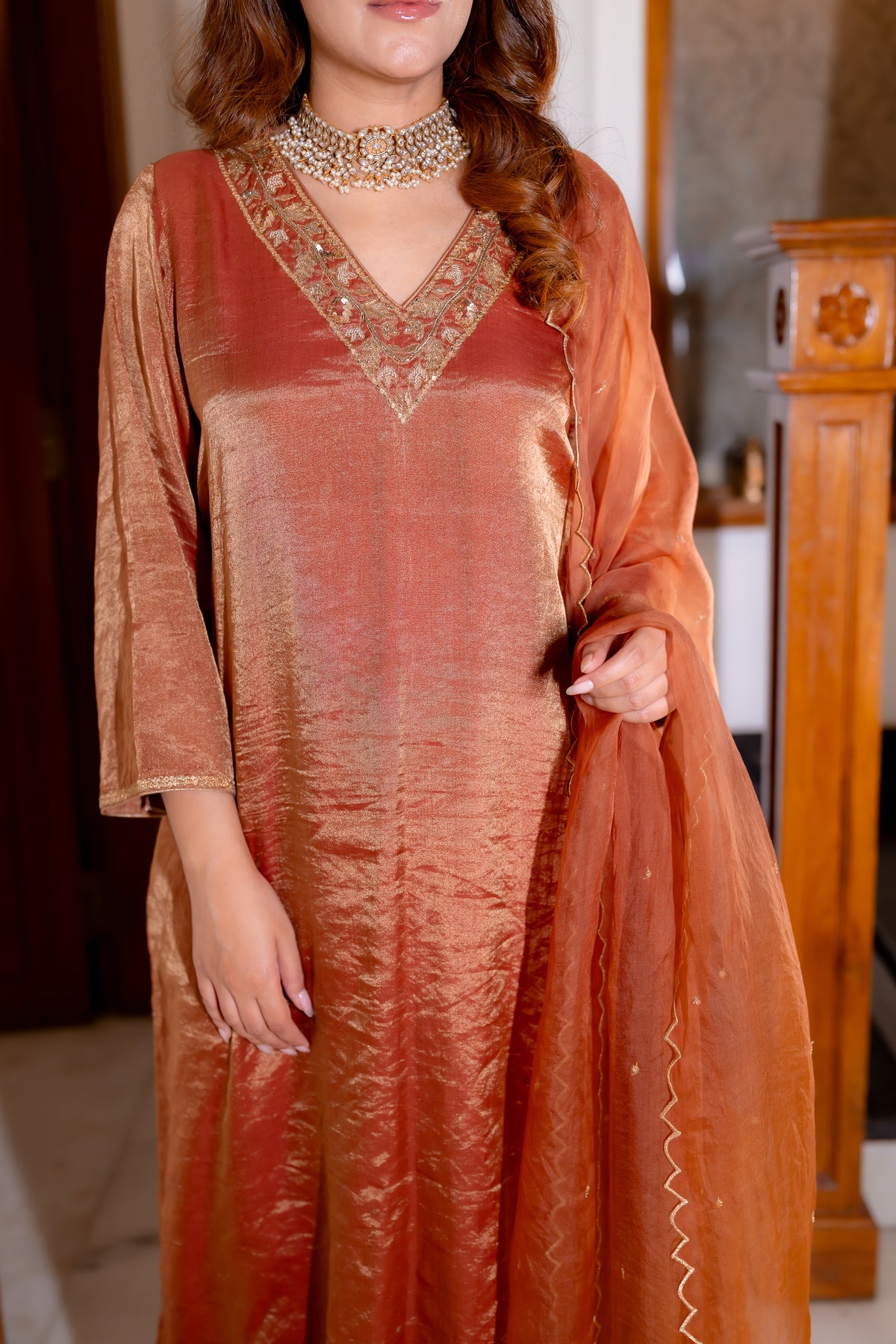 Front View of Tamra Copper Organza Kurta Set fabric.