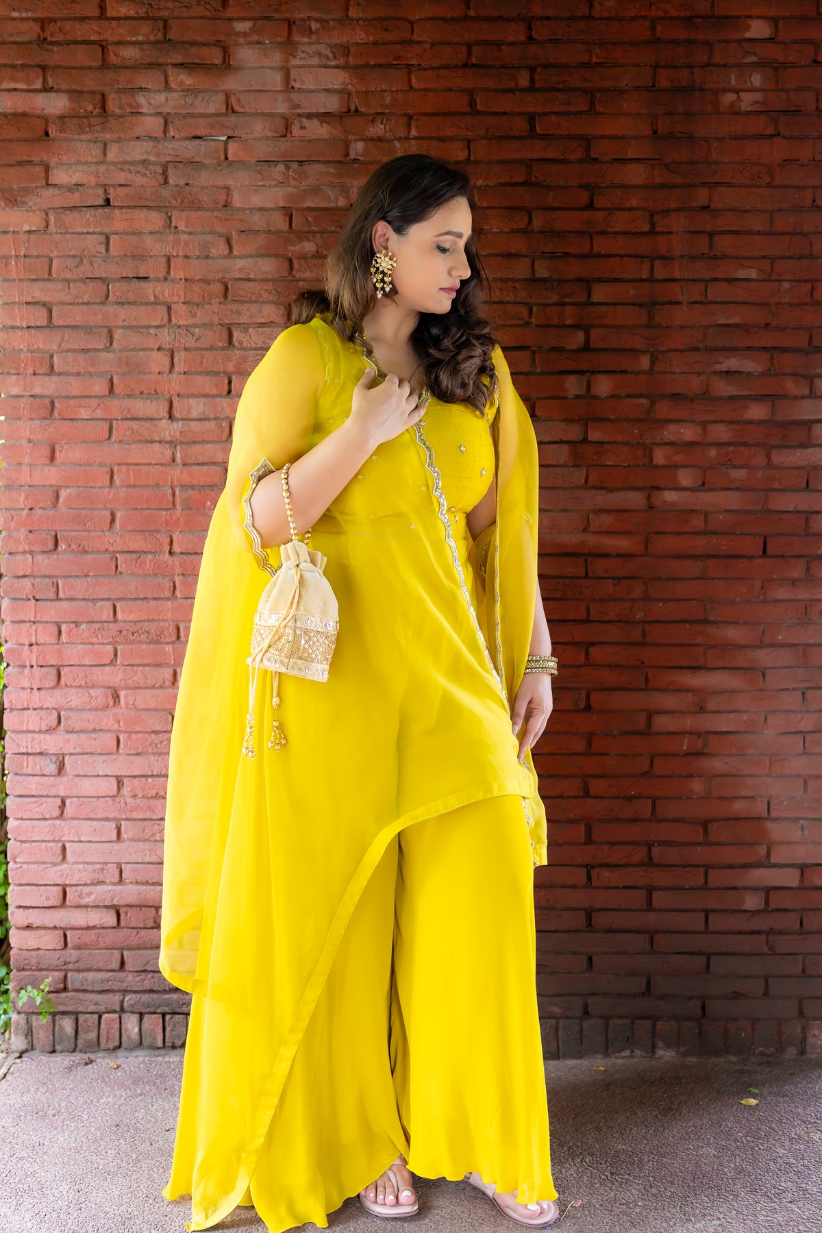 Full front view of sleeves design work of Bindu Noor Cape Palazzo set.