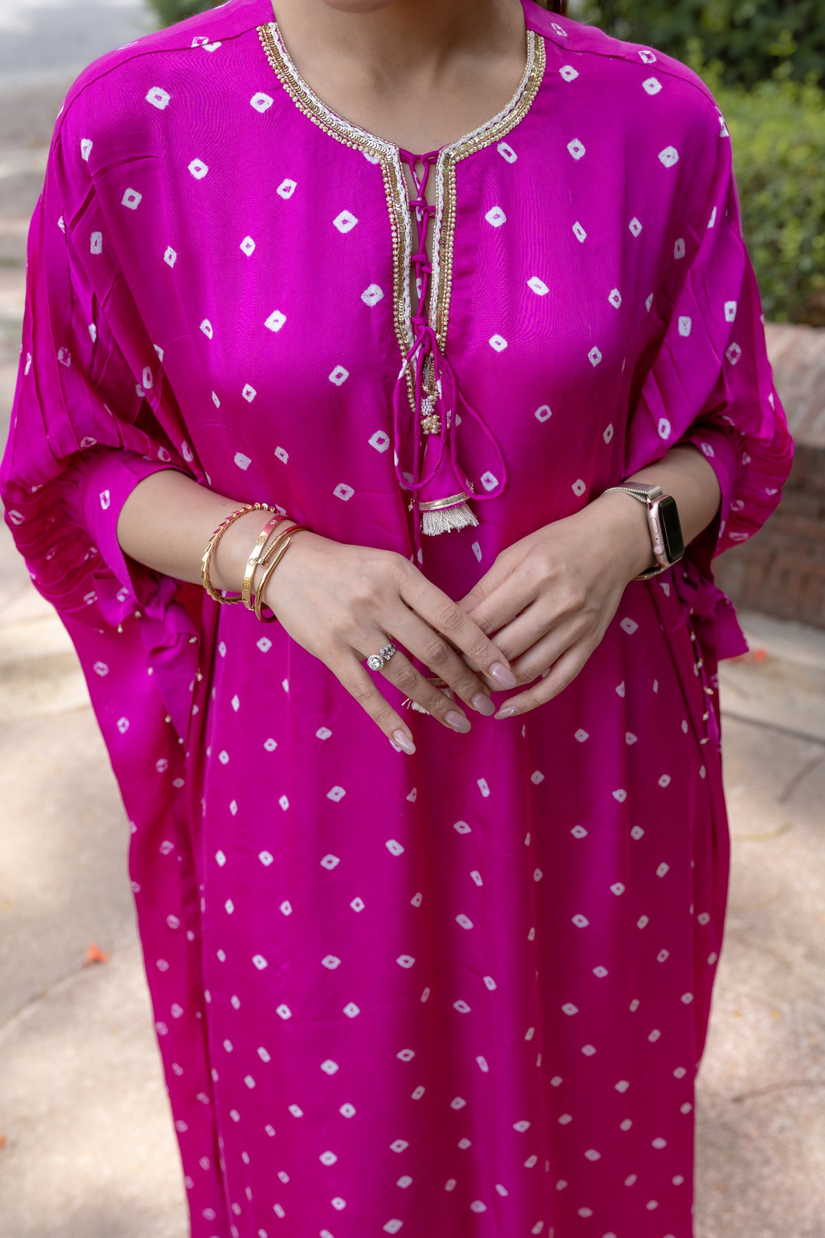 Close up view of Noor Bandhani pink Kaftan Set.