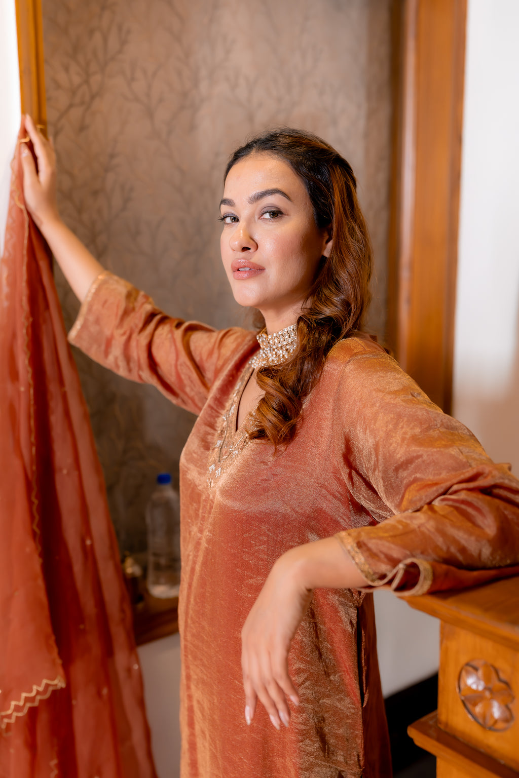Side view of Tamra Copper Organza Kurta Set.