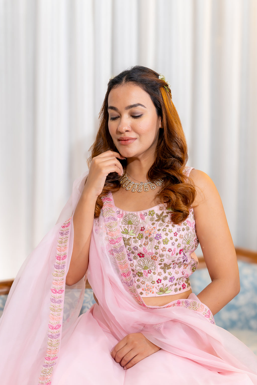 Close up Sitting View of Elara Rose Lehenga Set.