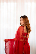 back view of model  in Pooja knotted Sheesha Blouse/skirt-set.