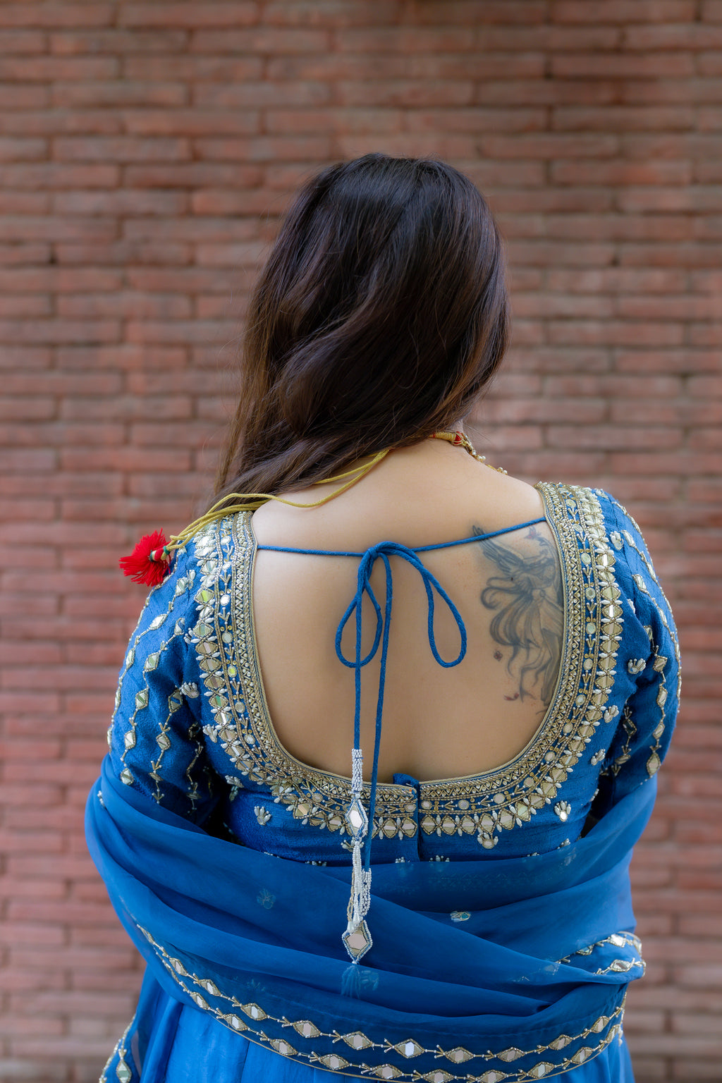 back close up view of Geet Royal Blue Lehenga Set.
