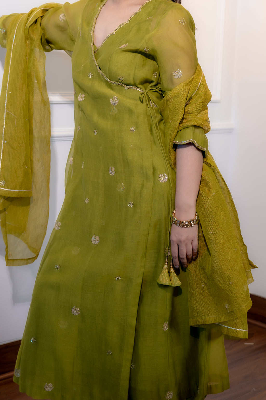 Close up view of neckline and work of Saaz Olive Festive Suit Set.