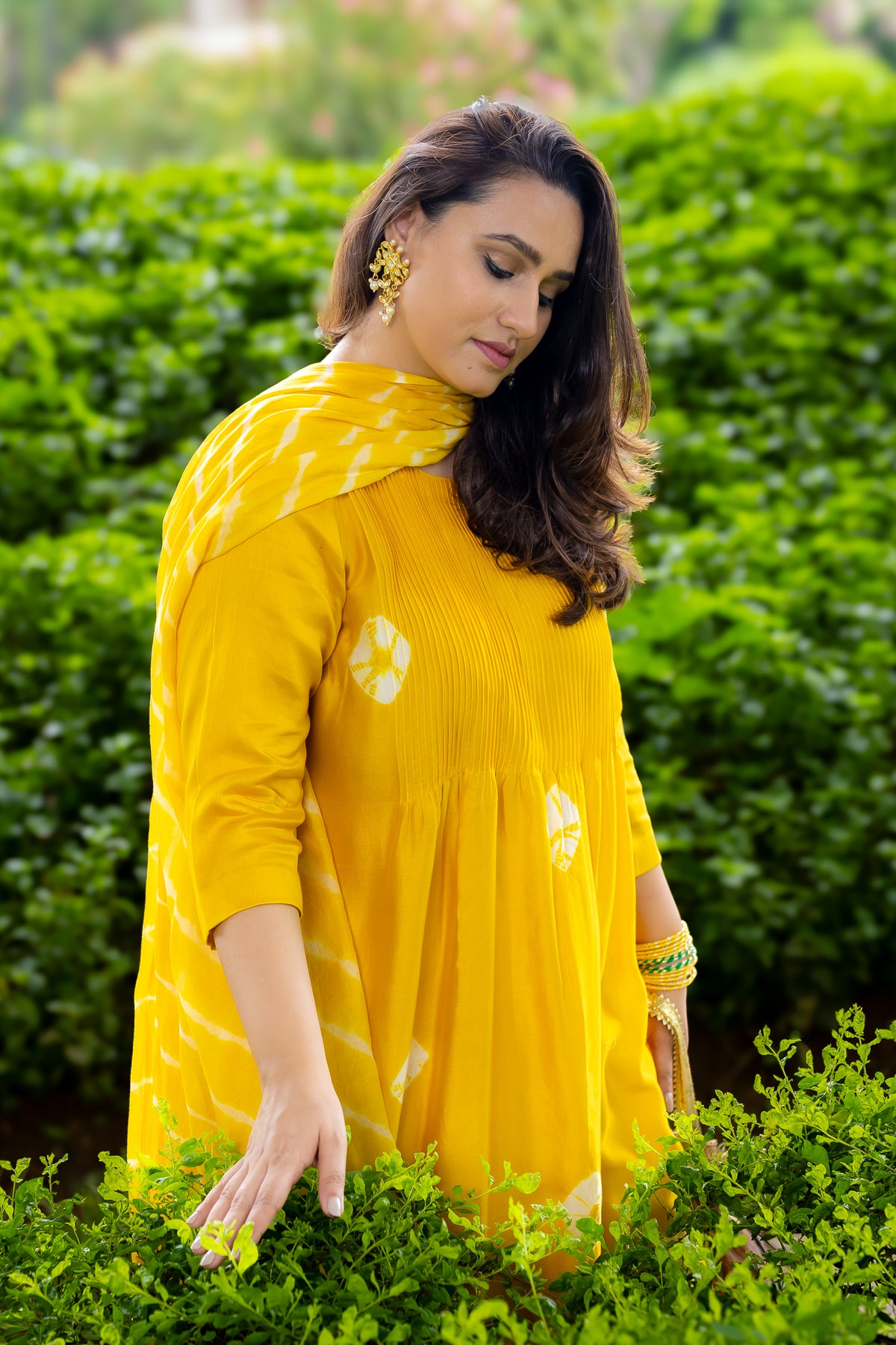 front close-up right view of yellow Bandhej kurta set