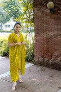front view of Noor Bandhani yellow Kaftan Set.