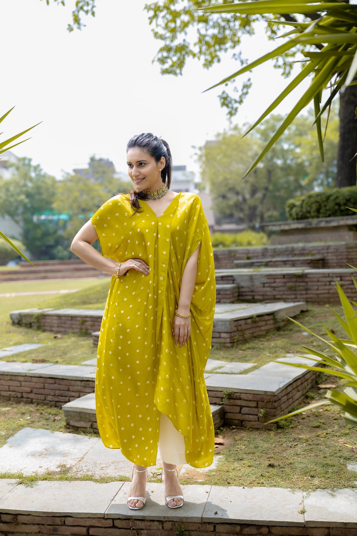 front view sidelook Noor Bandhani yellow Kaftan Set.