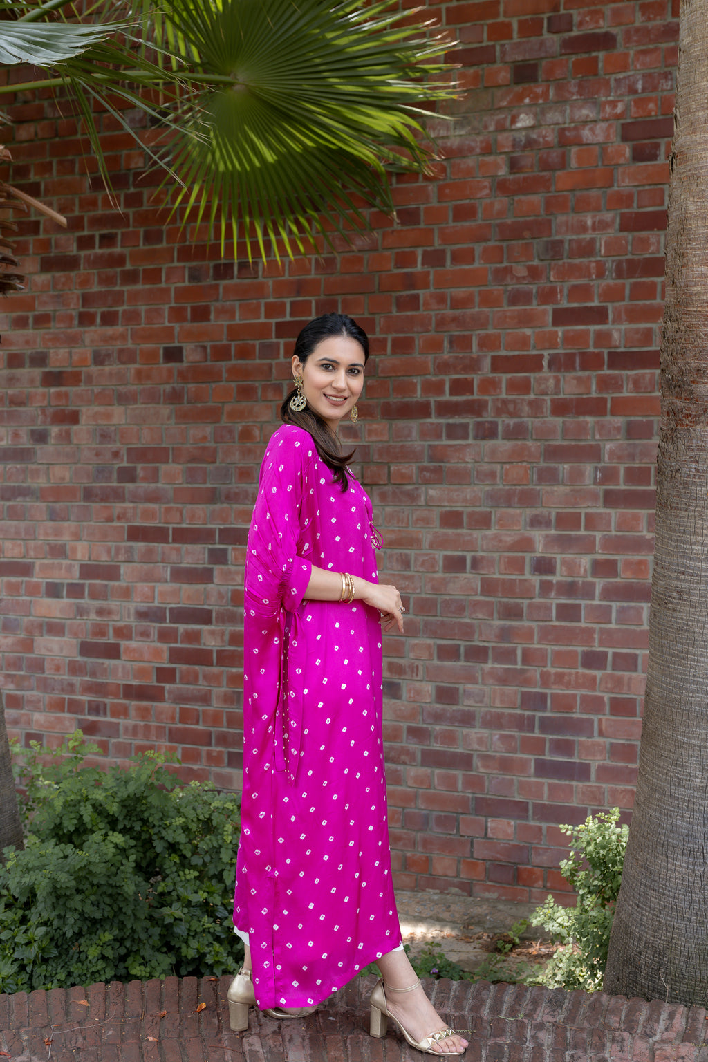 full side view of Noor Bandhani pink Kaftan Set.