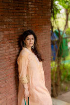 Model posing in Madhu Tissue Pocket Dabka set.
