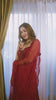 Model posing in pooja knotted sheesha blouse skirt set video.

