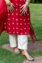 Front view of red patterned outfit