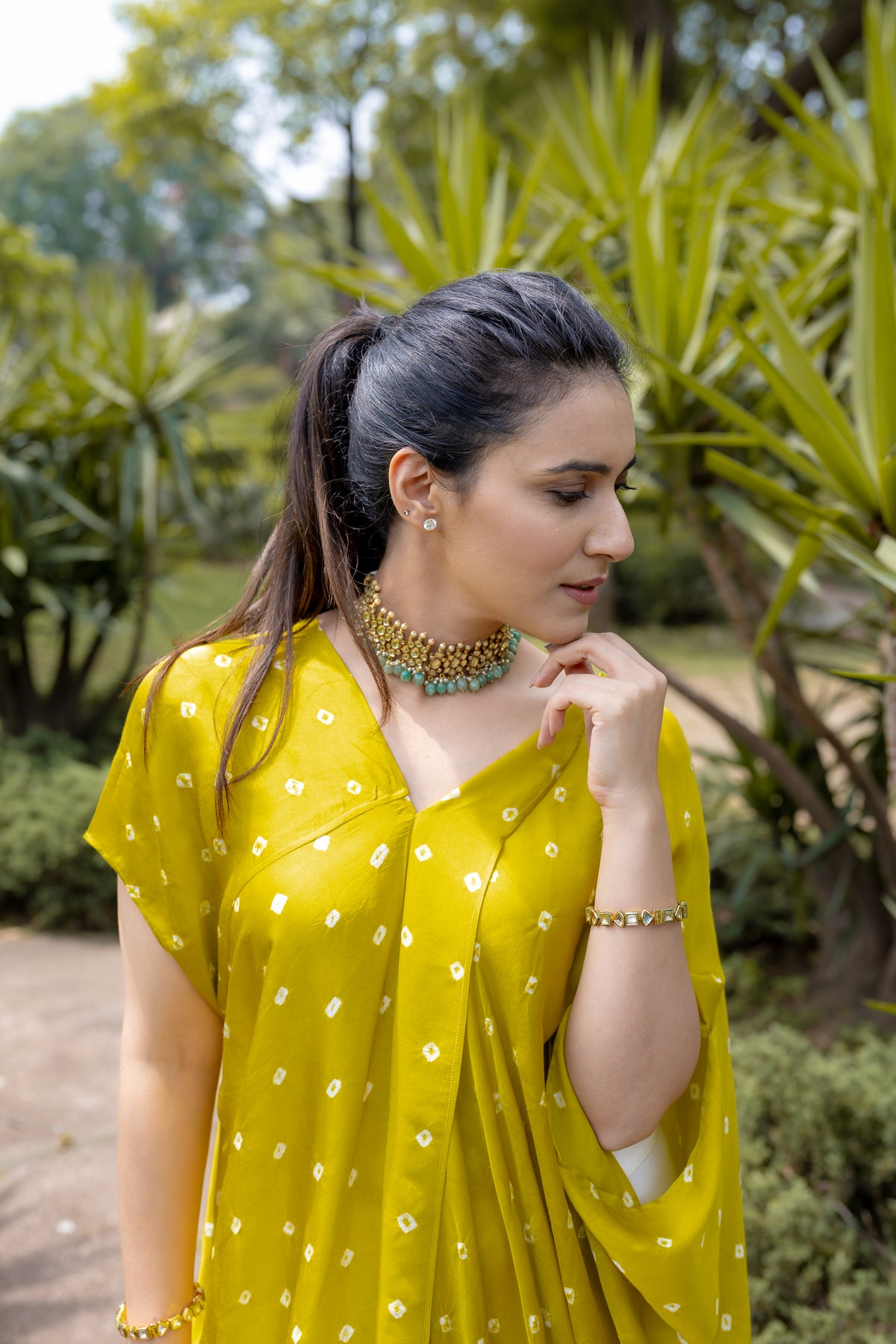 right view of Noor Bandhani yellow Kaftan Set.