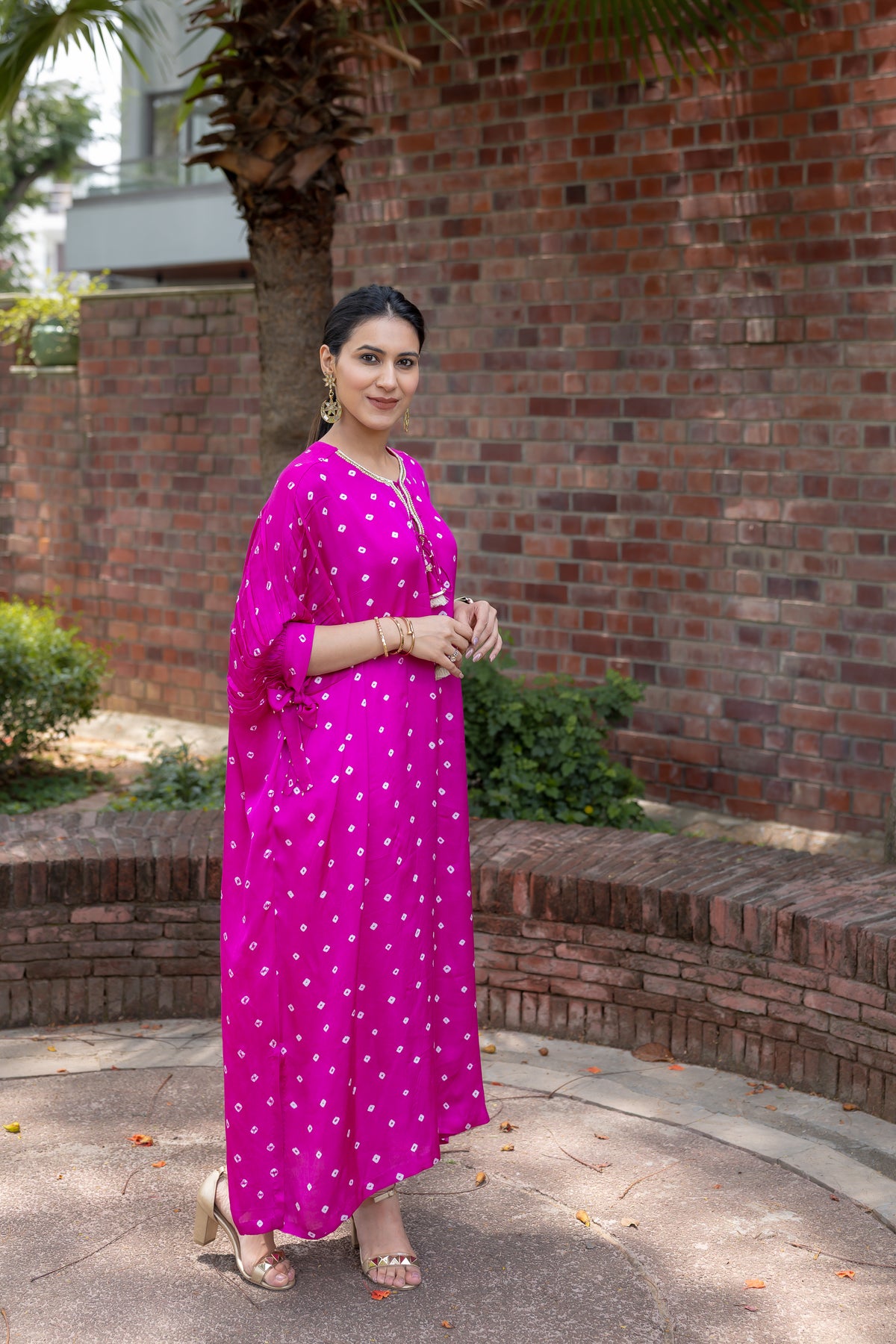 side view of Noor Bandhani pink Kaftan Set.