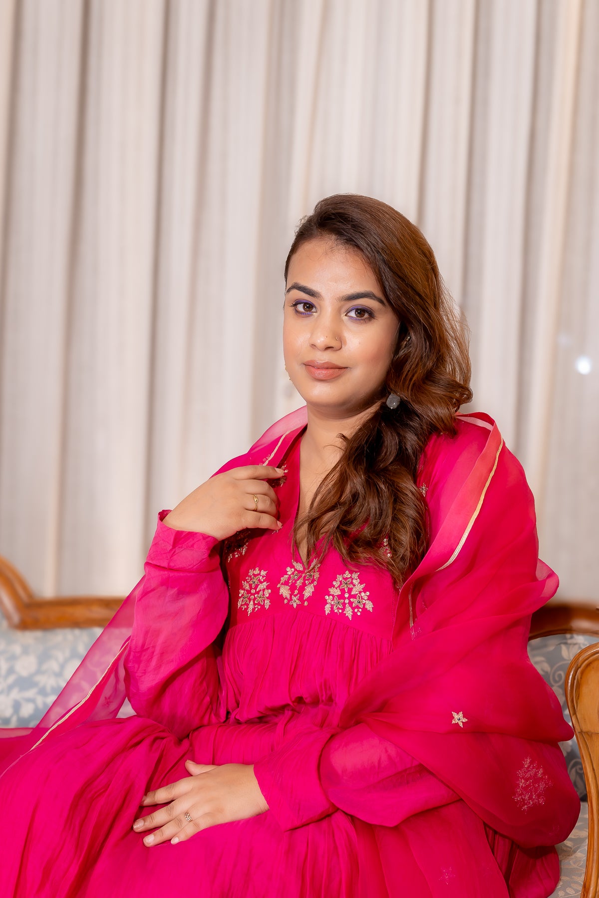 sitting view of Gulabi Pink Embroidered Kurta Set.