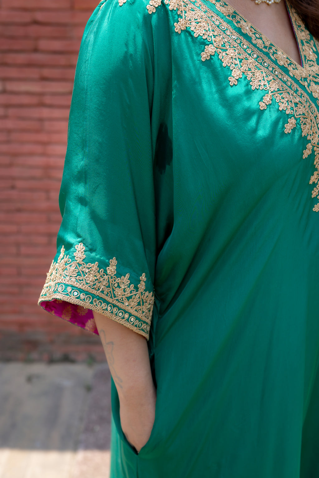 Close up view of sleeves and neck work of  Apoorva Kaftan set.