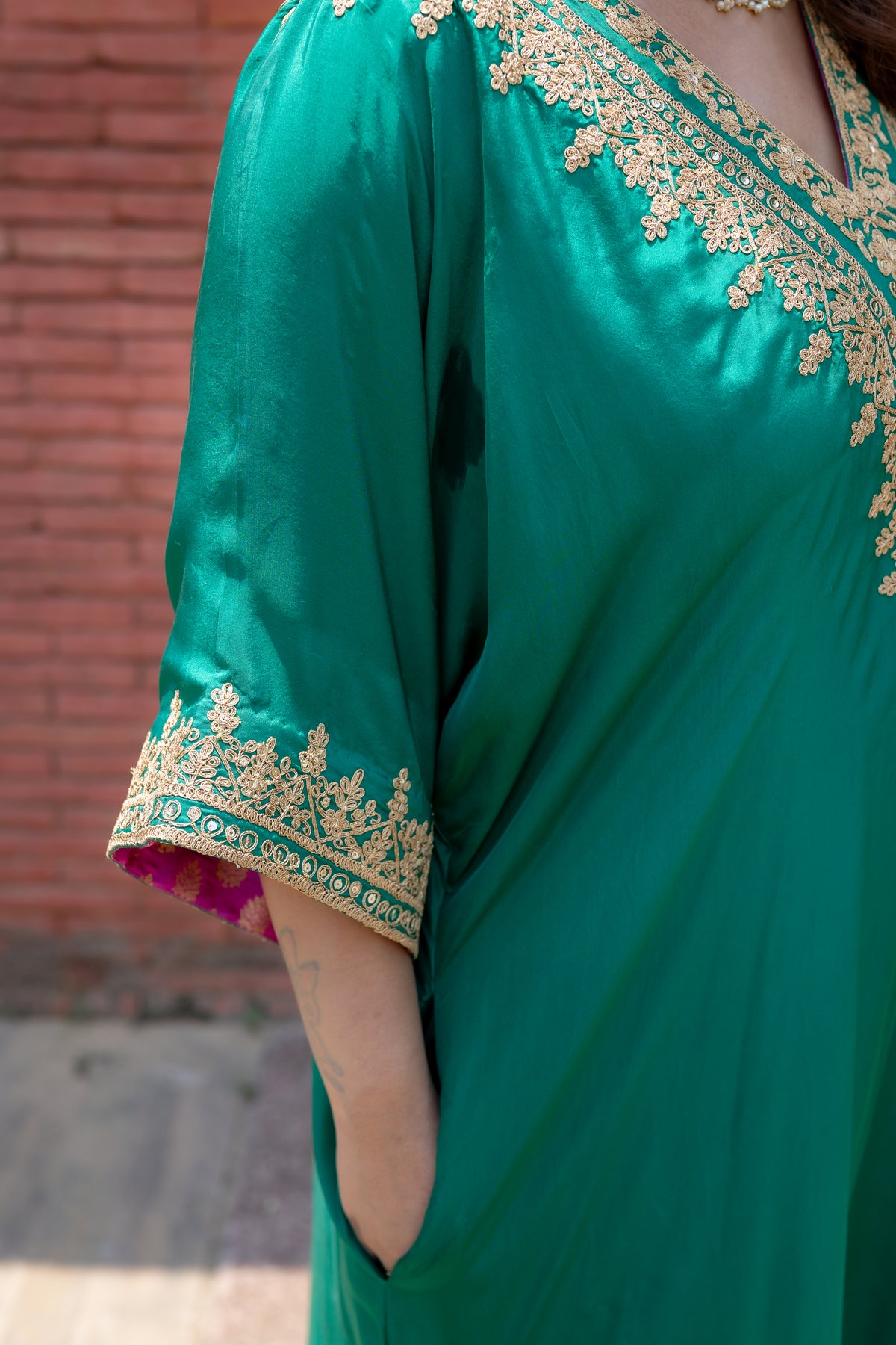 Close up view of sleeves and neck work of  Apoorva Kaftan set.